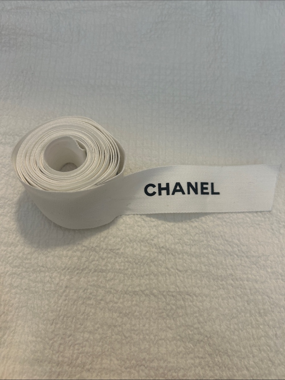 CHANEL Luxury White Ribbon Strand W/CHANEL Black Logo / Authentic / Used Once